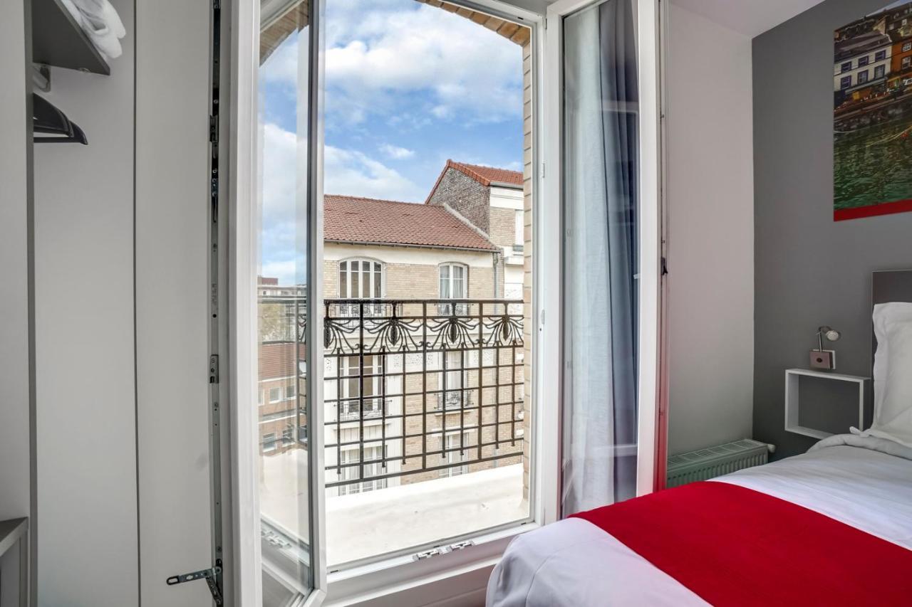 Paris Hotel Clichy Bagian luar foto
